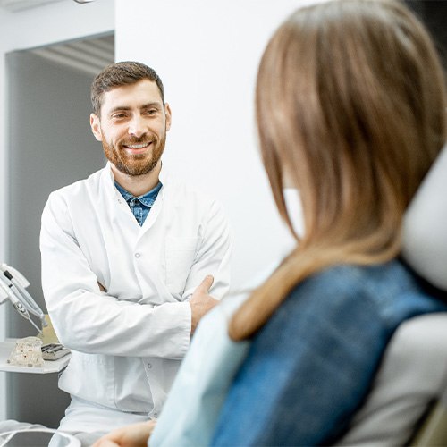 dentist explaining gum disease to patient